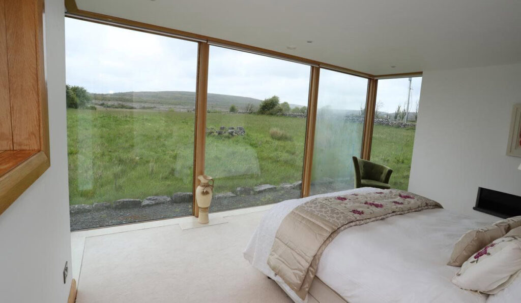 18th-century cottage up front with a modern 2-storey extension out back 4 Burren Bedroom