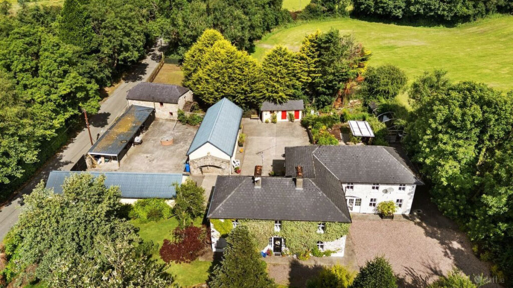 Mill house with the “best water in Ireland” at a great price 16 dronve view of buidings