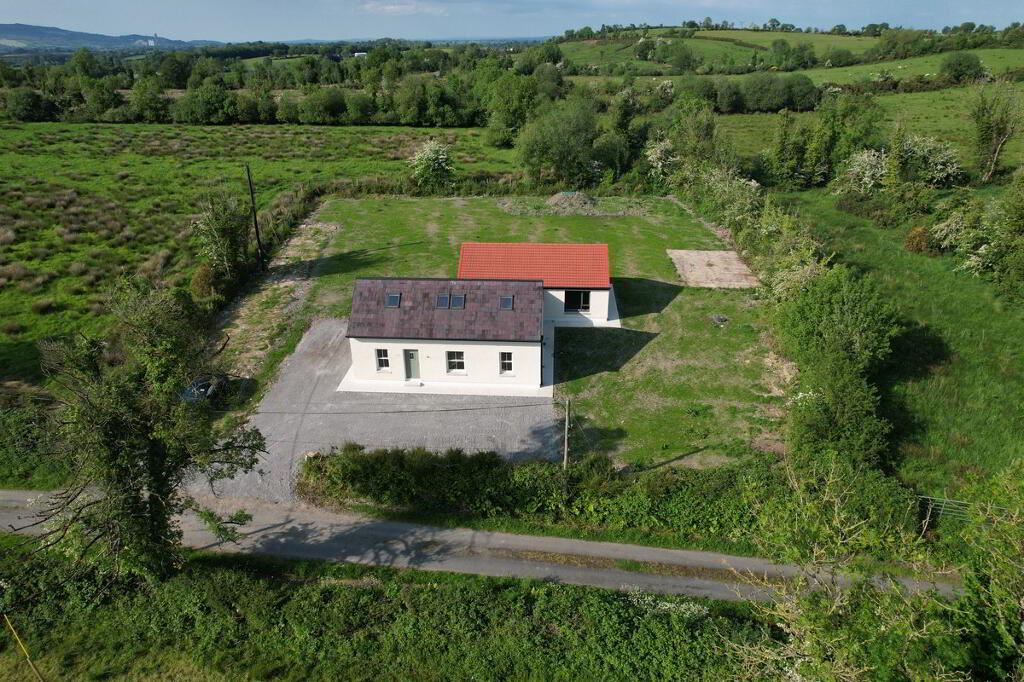 Father and teen son renovate a derelict house into an A-rated space for €245k 11 drone shot to front