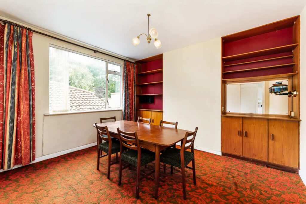 Does the renovation of this home and building to the side make financial sense? 11 dining room 1