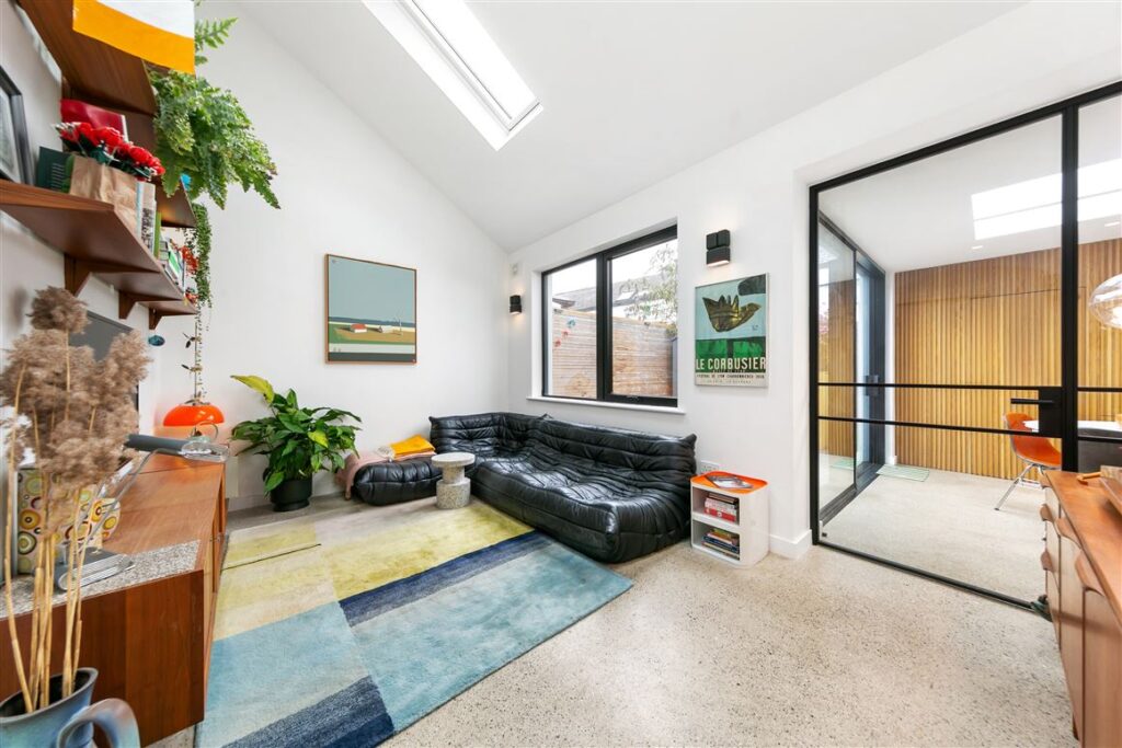 Bright, beautifully renovated two-bedroom period home in the heart of Portobello 3 living room 2