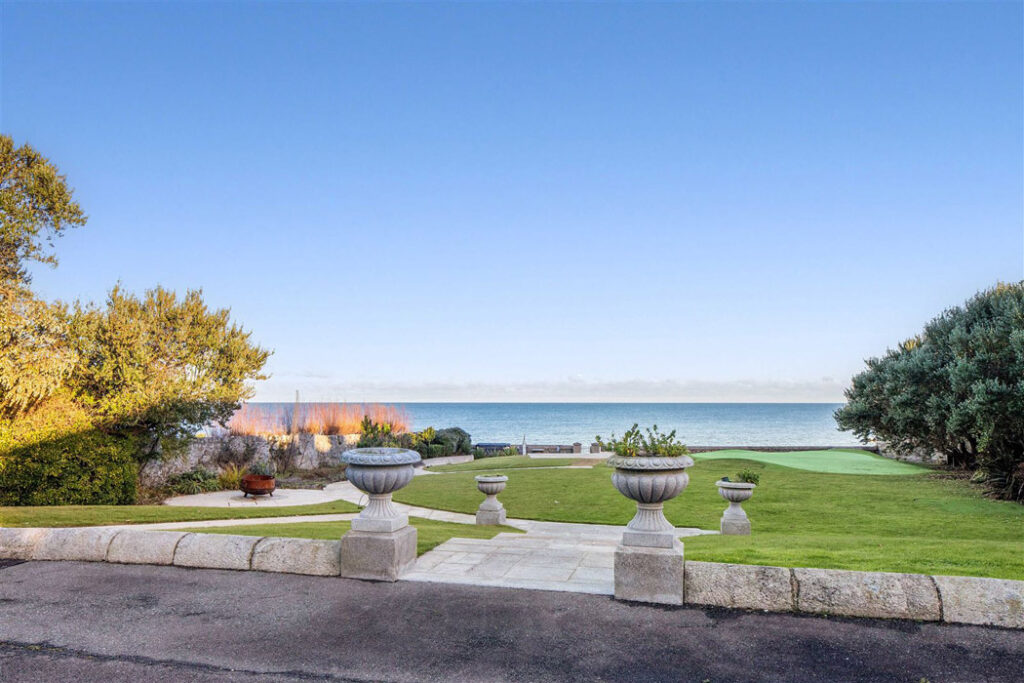 the gardens roll down to the sea