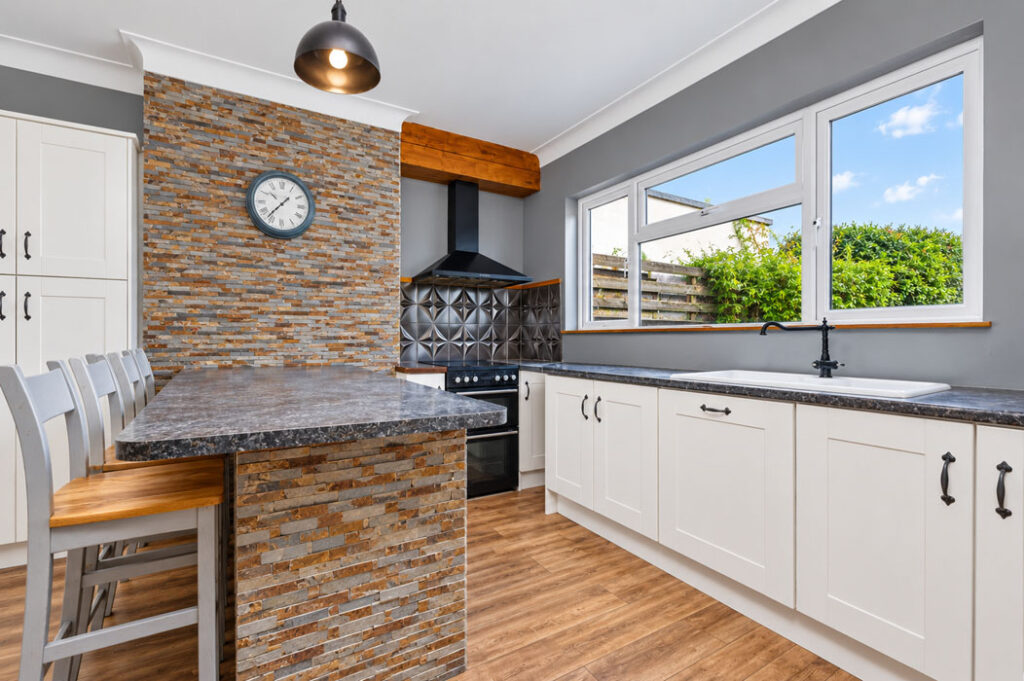 Glasnevin four-bed with ideal tax-free revenue stream 2 Bright Modern Kitchen with Stone Accents
