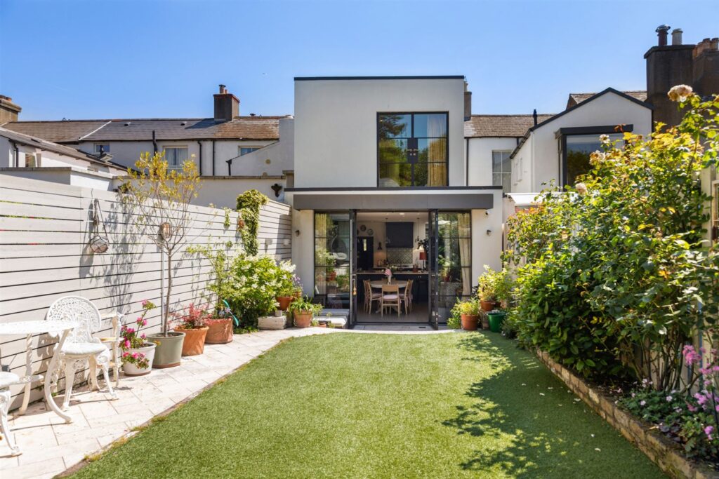 The sunny sherbet shades of this Sandymount four-bed fizz with personality 10 bak of house