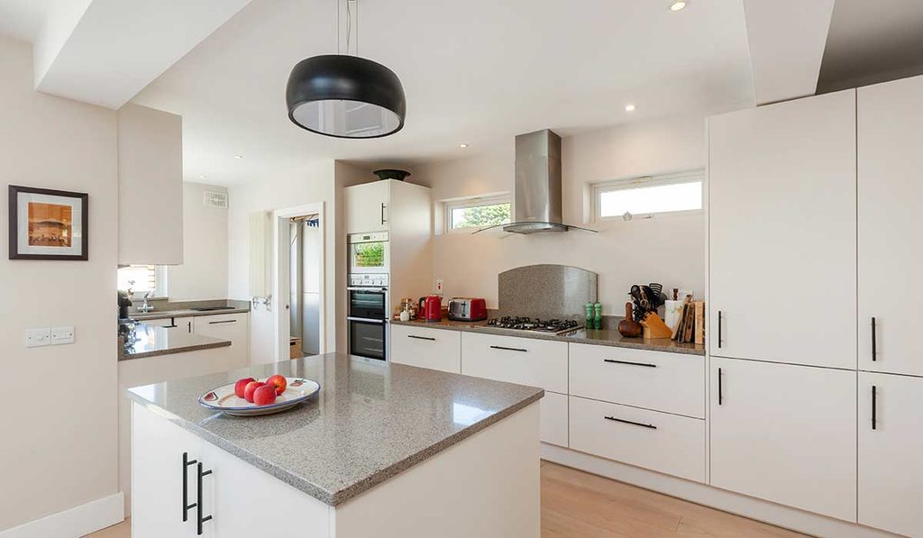 Renovated family three-bed in a Sutton American-style estate 4 bayside kitchen