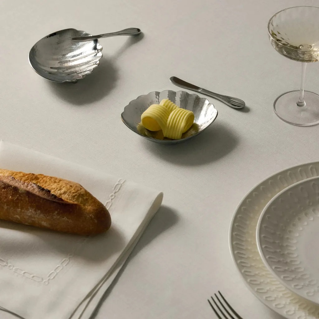 butter dishes on table