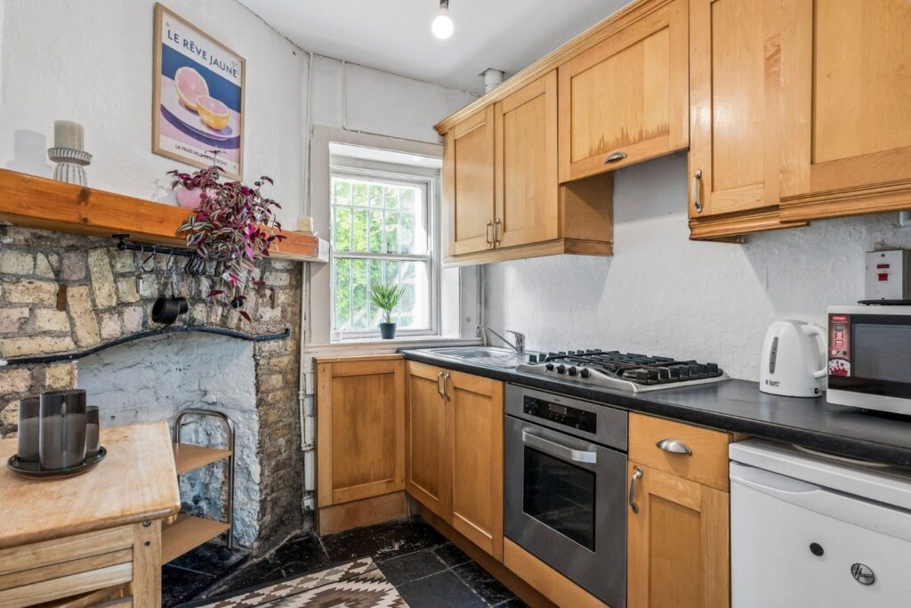 Rathmines property with a secret address for only €375k 3 kitchen and fireplace