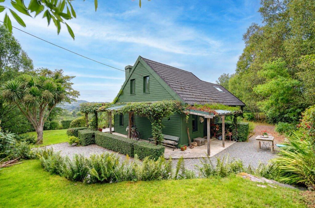 Rural idyll only 4.5 kilometres from thriving Kerry market town 2 side of house